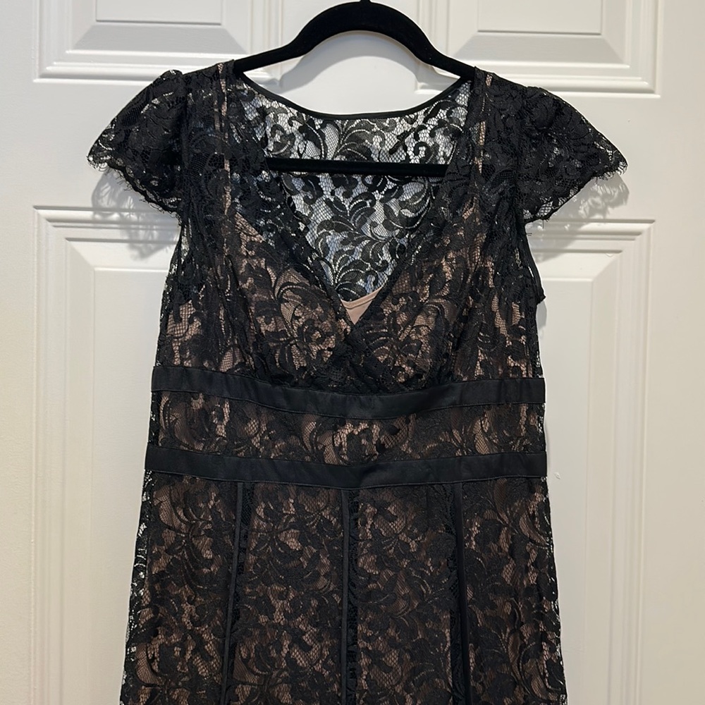 Beautiful Black lace dress with Nude slip lining